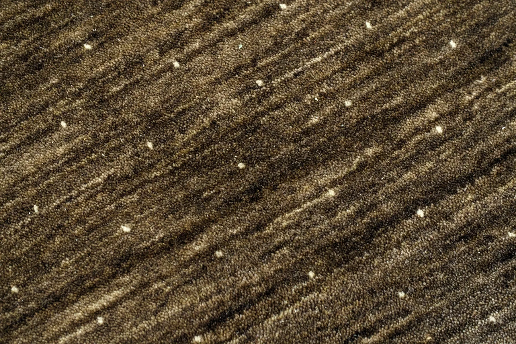 Gros plan sur les fibres d'une moquette