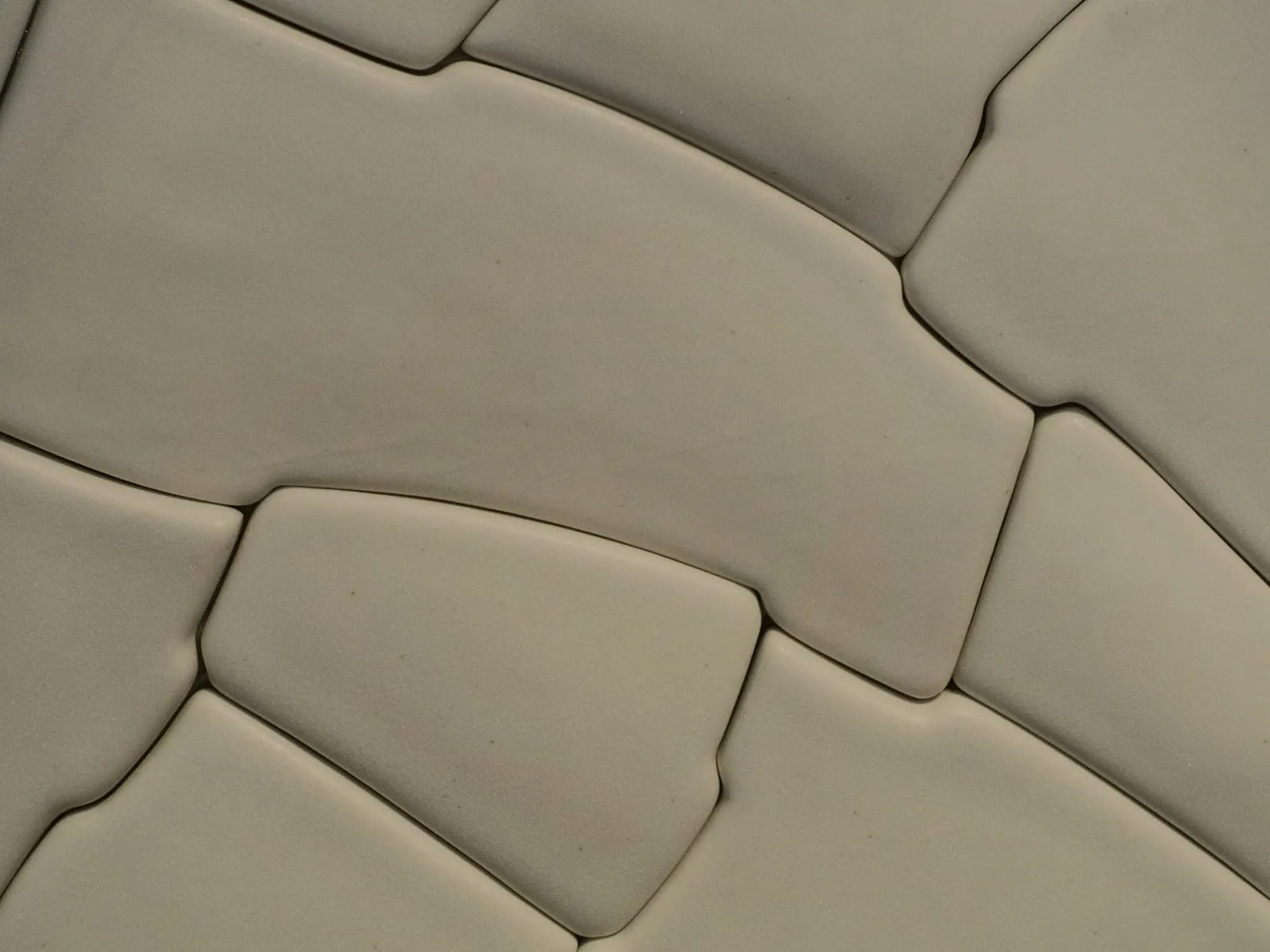 Shower tiles before: dull, stained grout lines