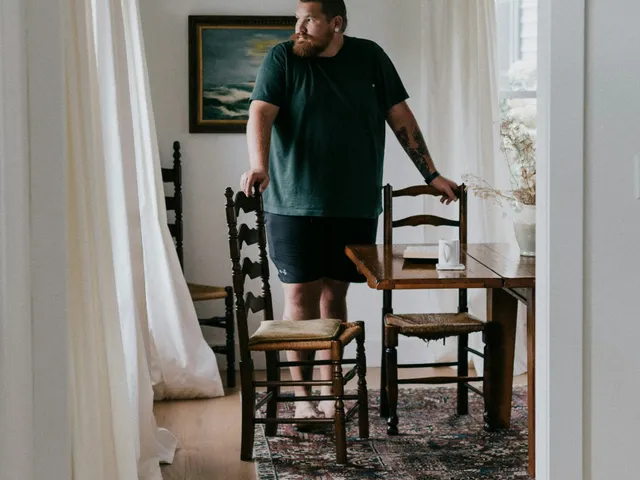 A crew lead walking through a dining room
